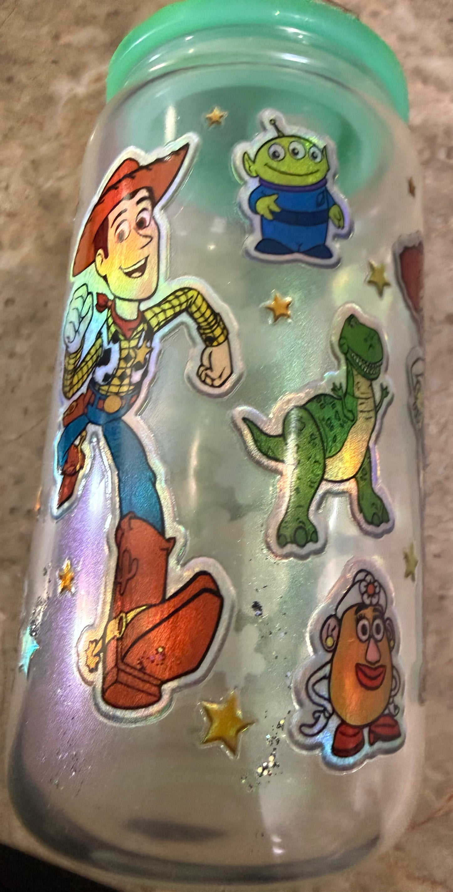 Toy Story Inspired 16 oz green shimmer Glass Cup with Holographic Design with decorative lid topper