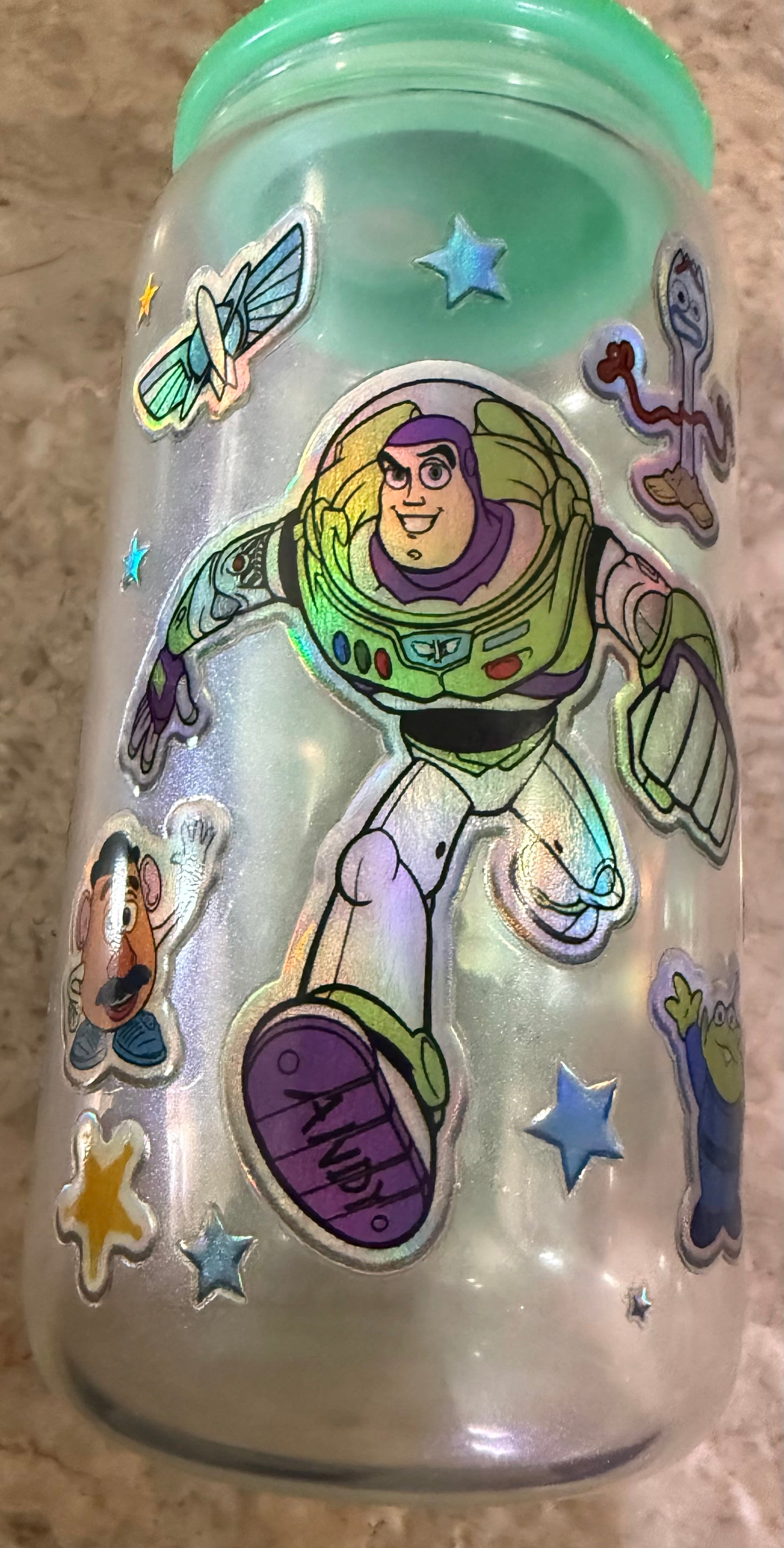 Toy Story Inspired 16 oz green shimmer Glass Cup with Holographic Design with decorative lid topper